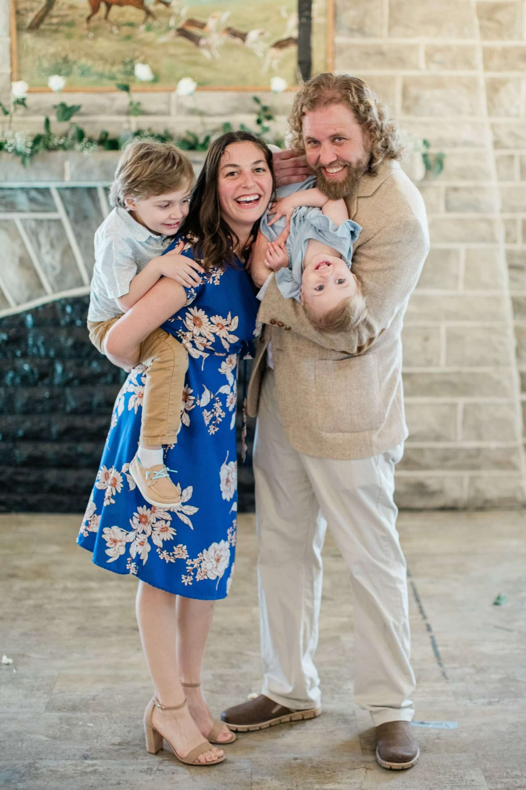 John with his wife Rachel, son Harvey, and daughter Charlie