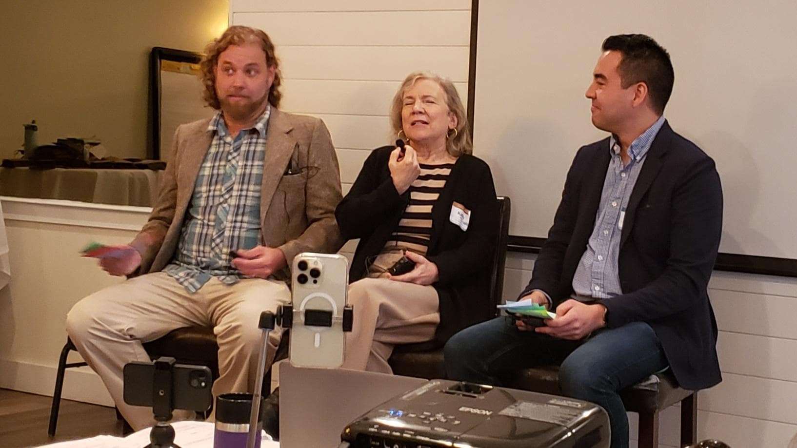 John fielding questions along with Kathy Greely, and David Tan